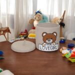 Beige cotton rope storage basket with embroidered teddy bear and Lovegirl Pattern, removable lid, and handles – 10x10 inches (25x25 cm) nursery hamper